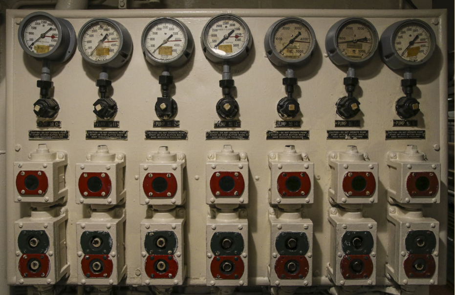 An illustration of white and red electric meter.