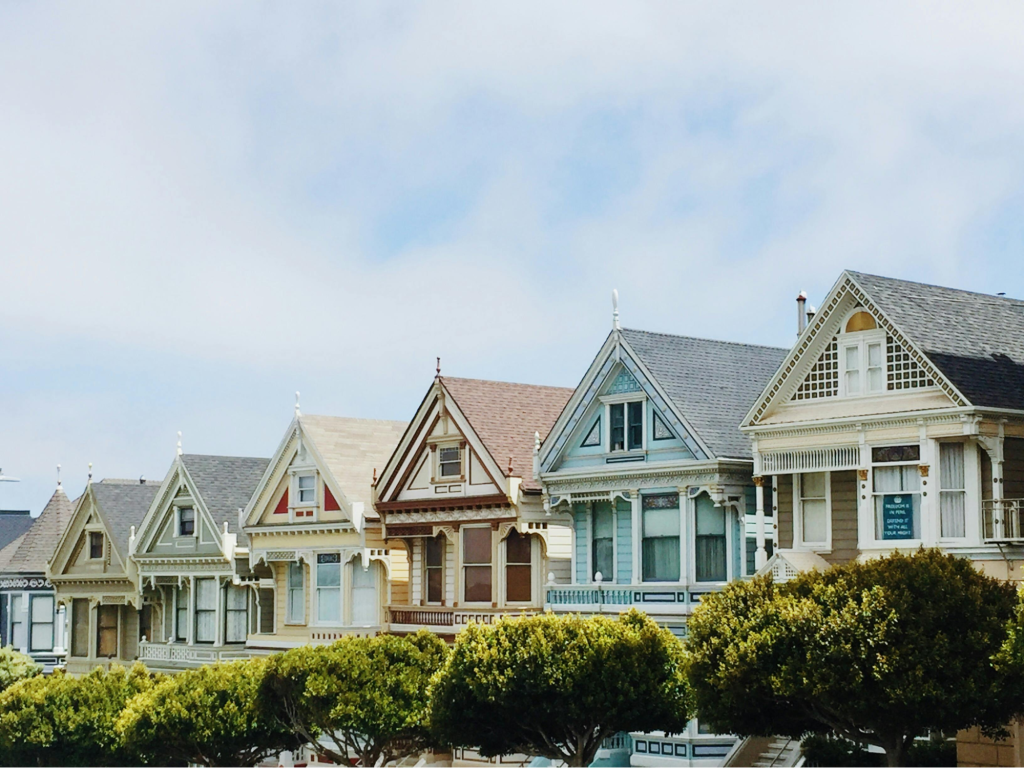 What is the function and lifespan of a gas heater regulator: a pastel-colored line of homes.