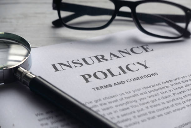 What sealant is used for gas fitting: an insurance policy on paper with a magnifying glass and a pair of black glasses.