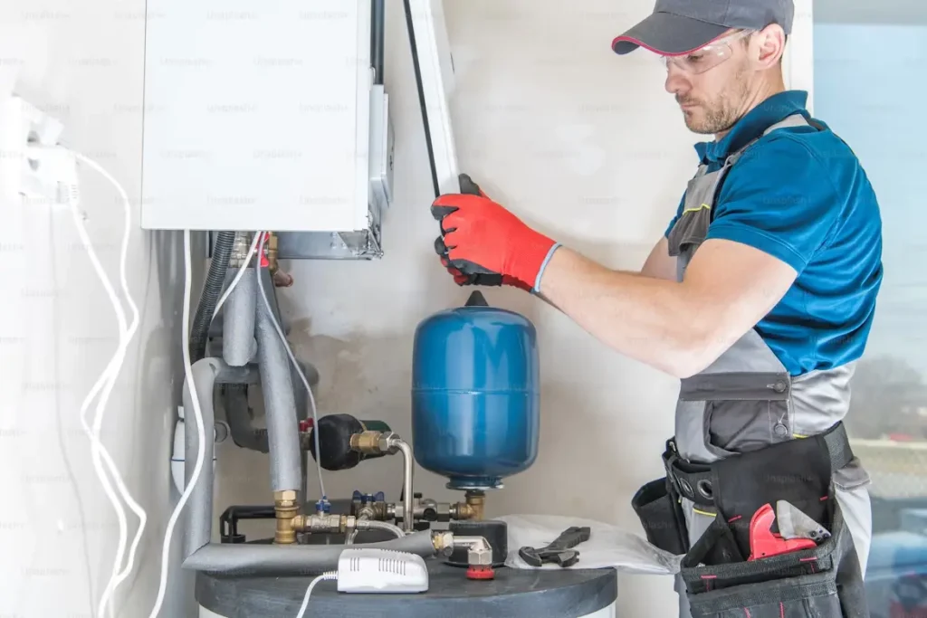 a professional plumber fixing gas stove leak